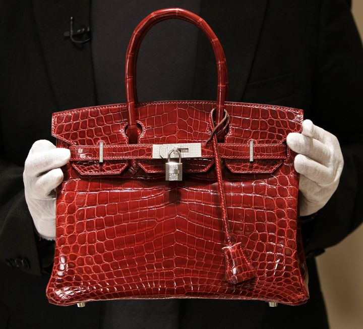 A crocodile Hermes Birkin bag, priced at $129,000, is seen during the opening of a Hermes store on New York City's Wall Street in 2007.