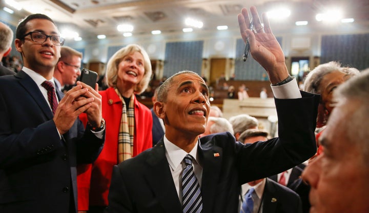 Obama waves goodbye to someone -- perhaps to America? (sniff) -- after his final State of the Union address.