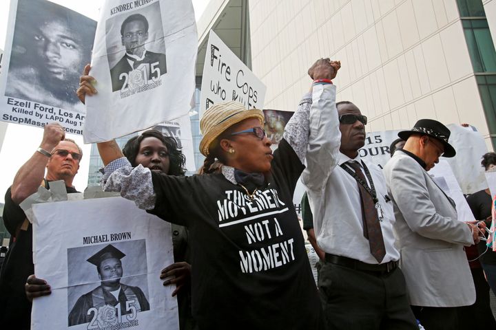 Demonstrators stand in solidarity before Black Lives Matter members hold a press conference outside the headquarters of the Los Angeles Police Department in January 2014.