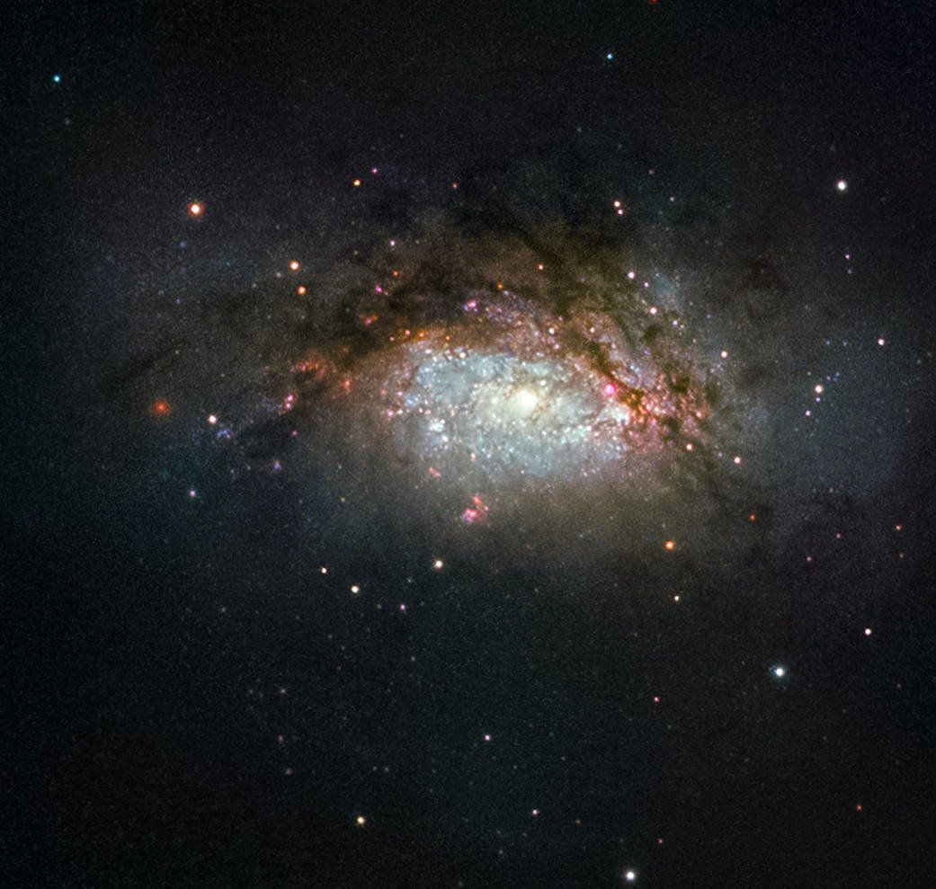 Hubble Space Telescope image of NGC 3597, a celestial object created by the collision of two galaxies.