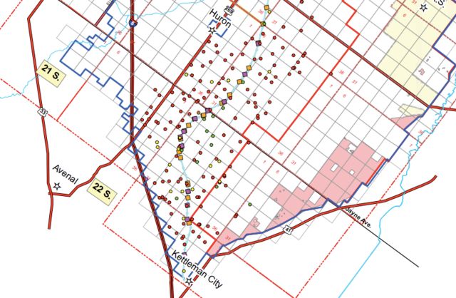 In 2015, the U.S. Bureau of Reclamation approved a project allowing Westlands Water District to pump groundwater into the California Aqueduct in areas near Huron and Kettleman City where land subsidence of 7 to 9 inches was recorded over the last two years. The green dots show wells used in the project, while the yellow squares indicate where water is being pumped into the aqueduct.