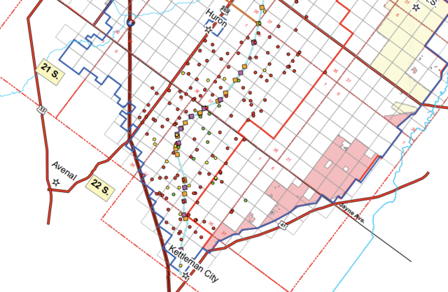 In 2015, the U.S. Bureau of Reclamation approved a project allowing Westlands Water District to pump groundwater into the California Aqueduct in areas near Huron and Kettleman City where land subsidence of 7 to 9 inches was recorded over the last two years. The green dots show wells used in the project, while the yellow squares indicate where water is being pumped into the aqueduct.