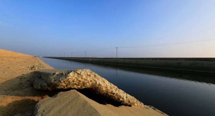 As groundwater pumping continues amid the ongoing California drought, the subsidence is causing roads and canals to crack as the earth collapses. This Jan. 13 image shows cracked concrete on the Delta Mendota Canal in the San Joaquin Valley.