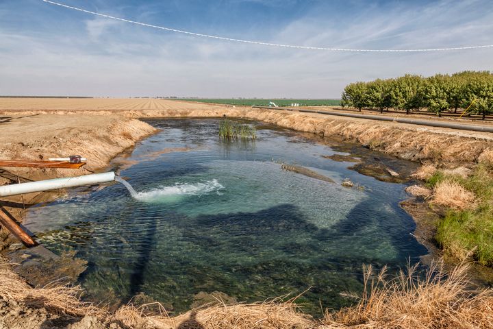 Environmental groups are concerned because some of Westlands’ groundwater, which is linked to Los Angeles drinking water supply, is contaminated. A groundwater well pumps into a holding pond in Fresno County, San Joaquin Valley.