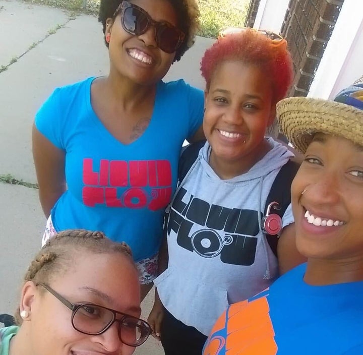 Liquid Flow Media Arts Center founder Stacy'e Jones, in gray, takes a selfie with her team while they shoot a promotional video to help raise funds.