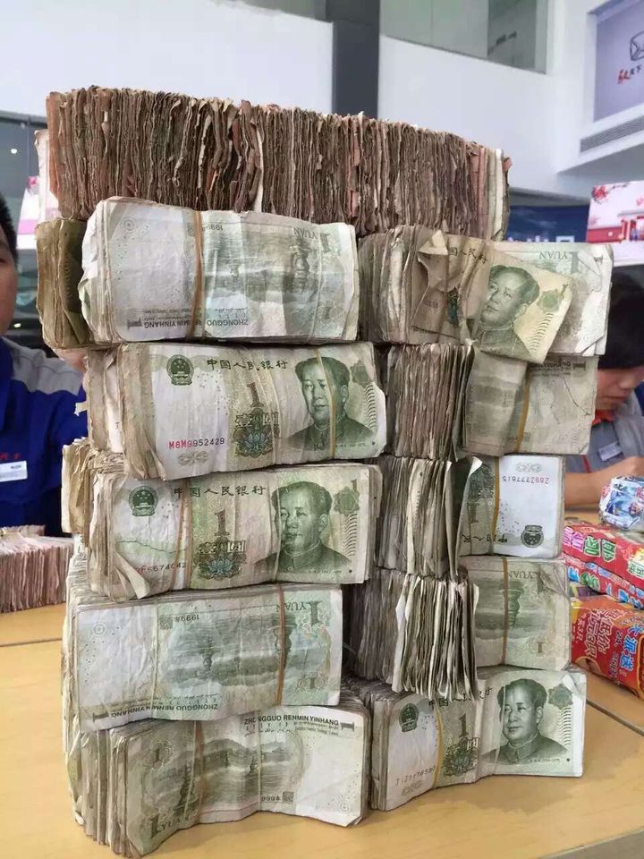 The man said he received payment in change, so he had too much cash to exchange at a bank.