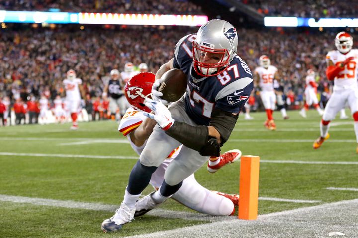 Rob Gronkowski scores for New England, as the Patriots took on the Kansas City Chiefs in a postseason game on Jan. 16, 2016. His play on Saturday helped him notch an all-time league record.