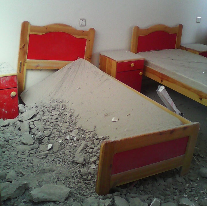 A photo taken right after the airstrike shows the damage to a third-floor bedroom at the al-Noor Center.