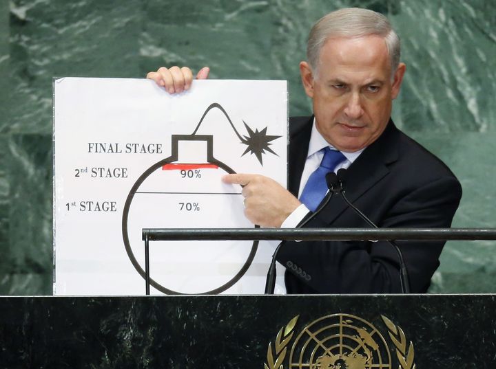 Benjamin Netanyahu points to a red line he drew on a graphic of a bomb while addressing the United Nations General Assembly.