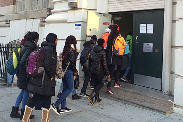 Students line up to enter the John Jay building, which houses four smaller high schools, in Park Slope, Brooklyn.