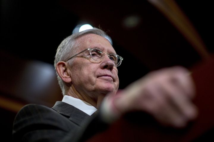 Senate Minority Leader Harry Reid (D-Nev.) says Republicans should vote on whether they agree with presidential front-runner Donald Trump's proposal to bar Muslims from entering the United States.