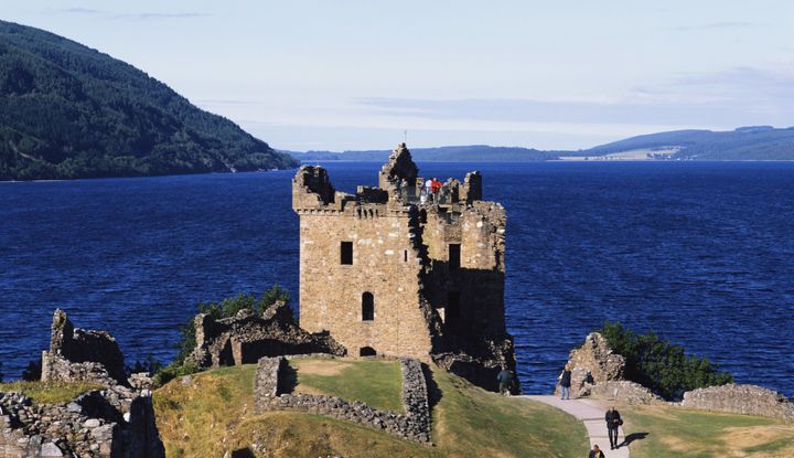 Urquhart Castle sits on the edge of Loch Ness, which some people believe is the home of "Nessie." A boat captain claims to have found a trench in which the famous sea monster may be hiding.