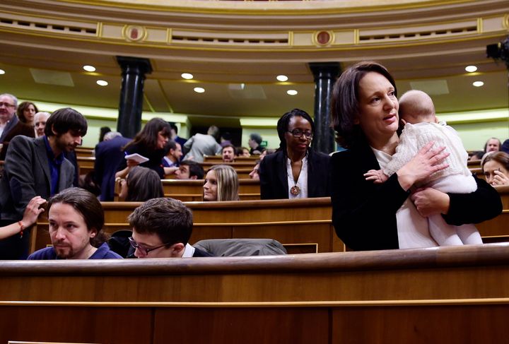 Left wing party Podemos' deputy Carolina Bescansa garnered criticism and praise when she brought her baby to parliament in Spain on Jan. 13.