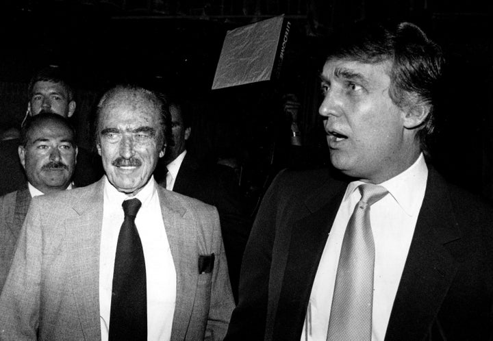 Donald Trump and his father, Fred, at a dinner in 1989.