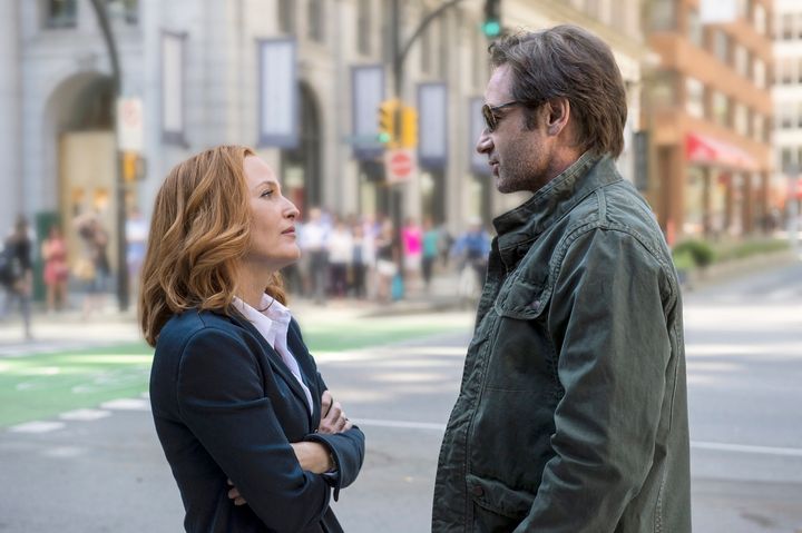 Gillian Anderson as Dana Scully and David Duchovny as Fox Mulder.