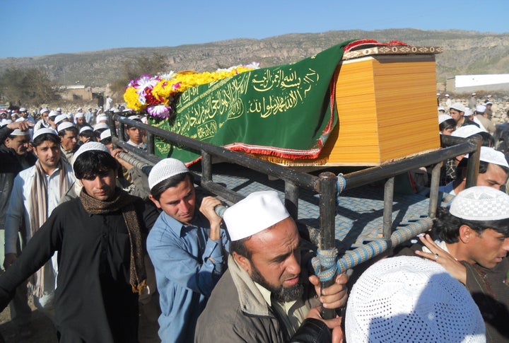 Mourners carry the coffin of one of the 21 Pakistanis killed at Bacha Khan University, Jan. 20, 2016. The incident has w