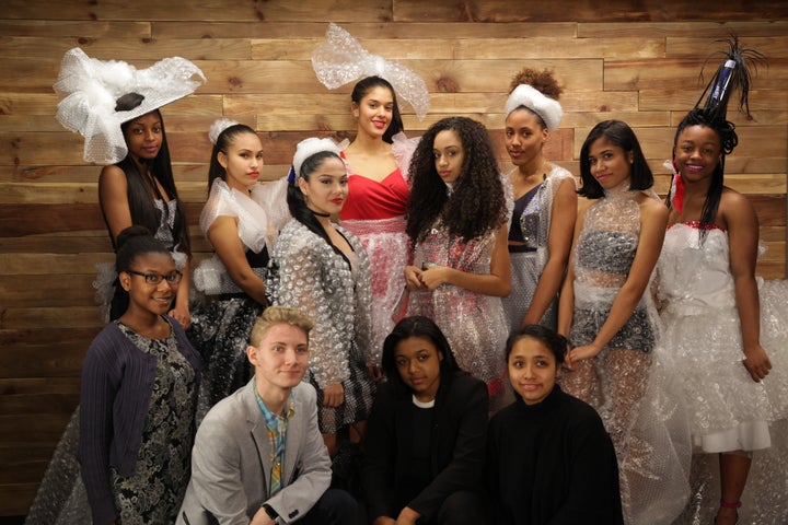 The Fashion With A Purpose Club students modeling their designs, post-fashion show.