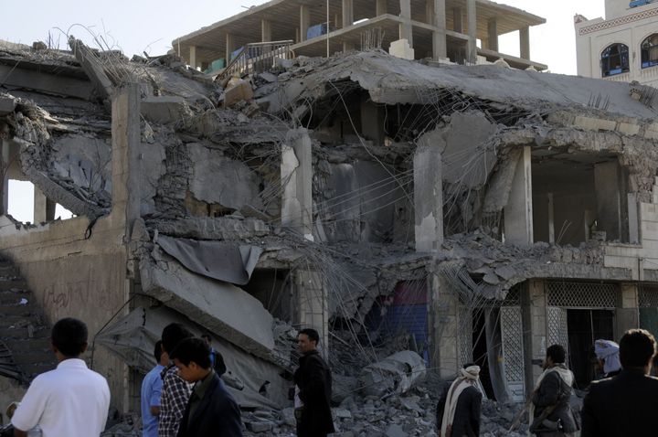 Doctors Without Borders is calling for a full investigation into a deadly attack on a hospital in Yemen earlier this month that reportedly claimed six lives. Above, civilians observe a collapsed building in Sanaa, Yemen.
