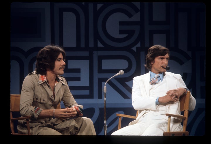 Geraldo Rivera, left, and Hugh Hefner filming a "Tribute to Marlon Brando" on June 6, 1974.