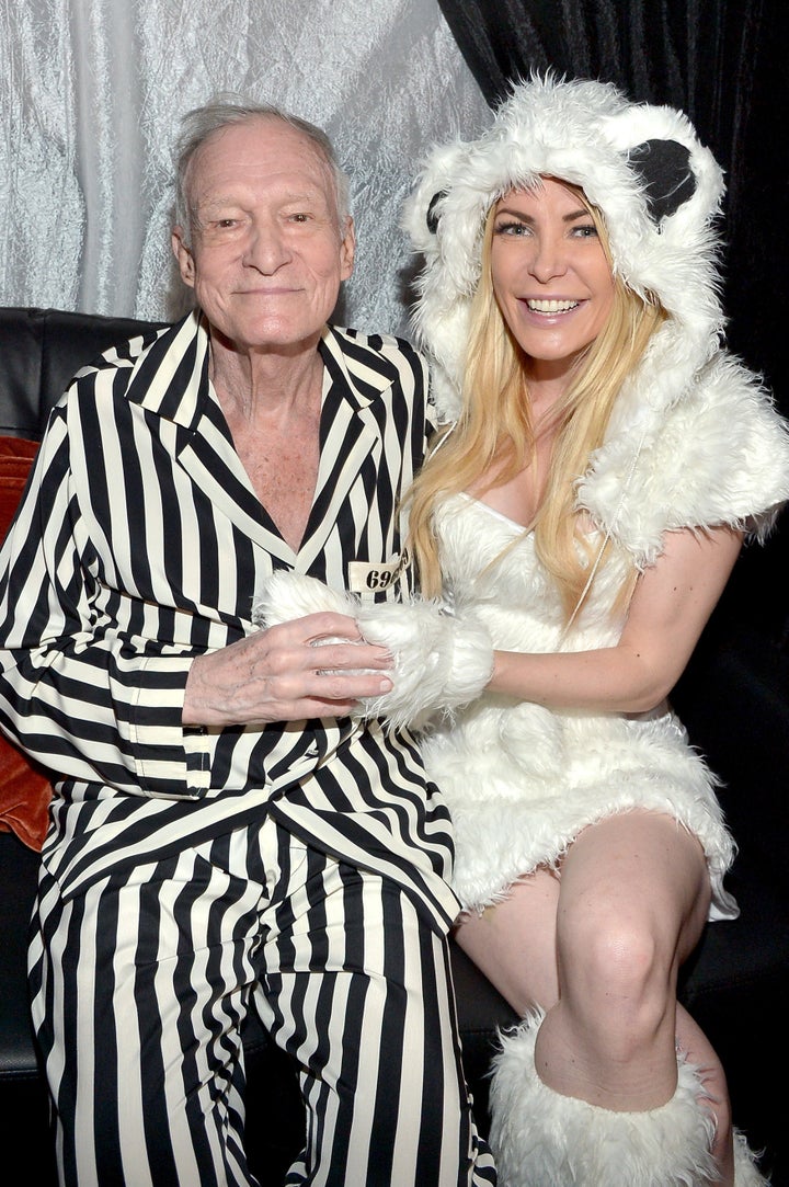 Hgh Hefner and wife Crystal Hefner attend the annual Halloween Party at the Playboy Mansion on Oct. 24, 2015.