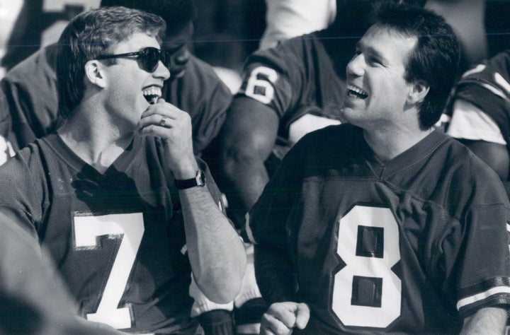 Now coach Gary Kubiak as a member of the Denver Broncos. Kubiak is pictured here next to teammate John Elway.