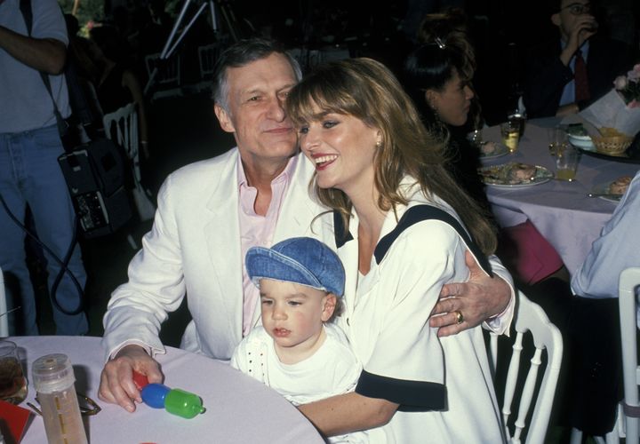 Hugh Hefner, Marsden Hefner and wife Kimberly Conrad at the Playboy Playmate of the Year Celebration on April 25, 1991. 