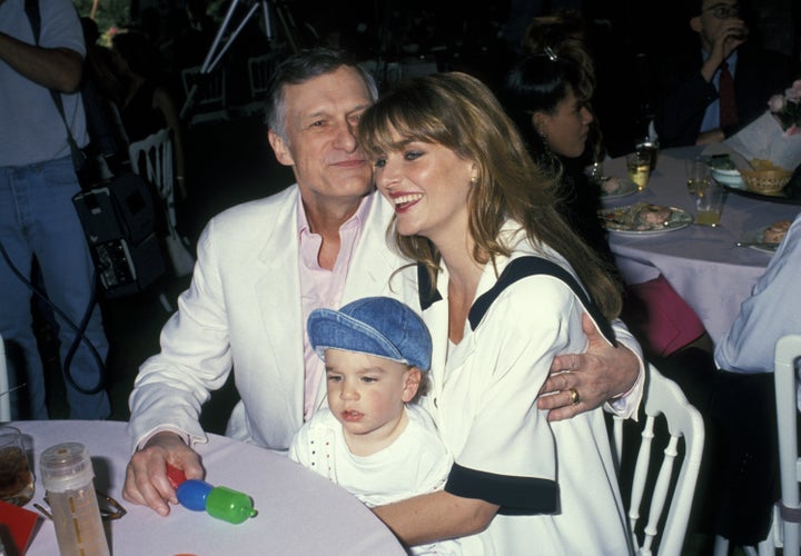 Hugh Hefner, Marsden Hefner and wife Kimberly Conrad at the Playboy Playmate of the Year Celebration on April 25, 1991.