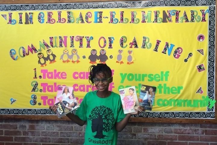 Marley Dias poses enthusiastically at a book drive at Lingelbach Elementary School in Philadelphia.