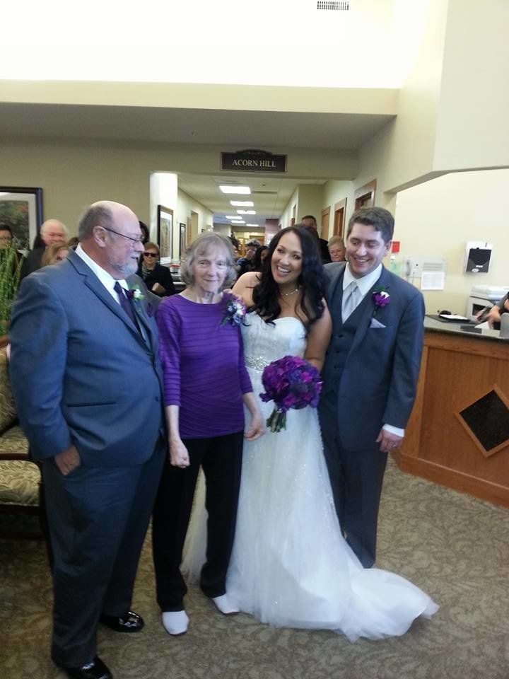 From left: Umberto Napilitano, Linda Napolitano, Julia Napolitano and her husband, Justin Phillips at a wedding reception held at the assisted care facility where Linda Napolitano lives.