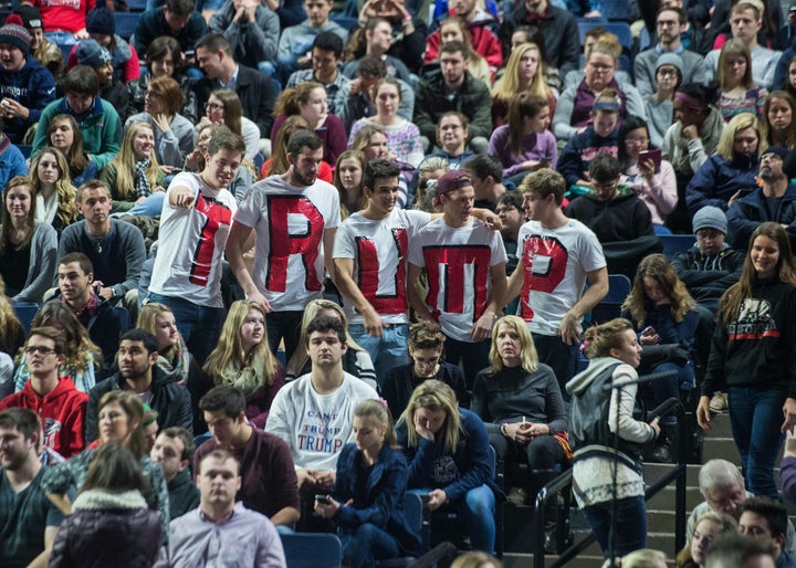 Supporters of Republican presidential candidate Donald Trump attend a rally at Liberty University in Lynchburg, Virginia, on