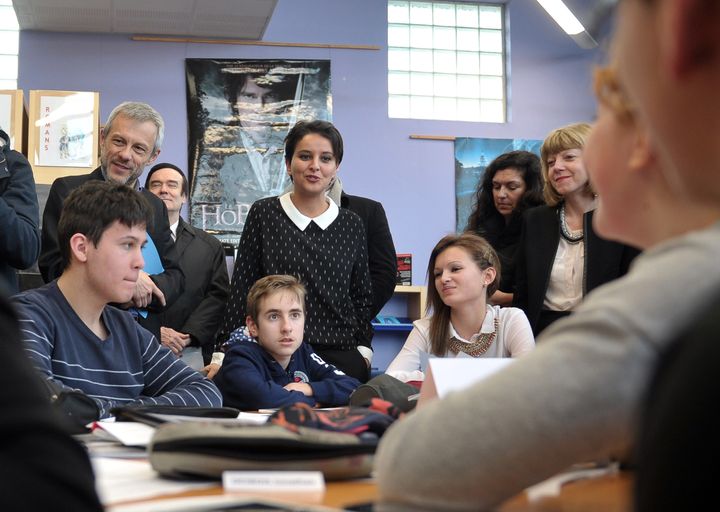 French Education Minister Najat Vallaud-Belkacem speaks with students at the Paul Eluard secondary school in Beuvrages, France, on Jan. 18, 2016.