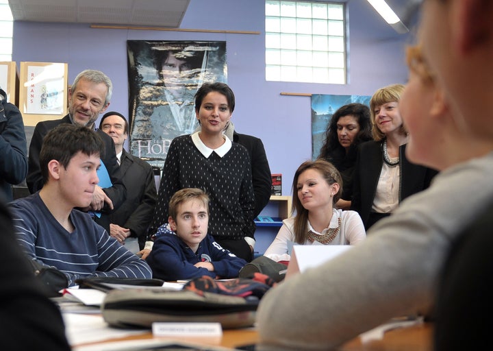 French Education Minister Najat Vallaud-Belkacem speaks with students at the Paul Eluard secondary school in Beuvrages,