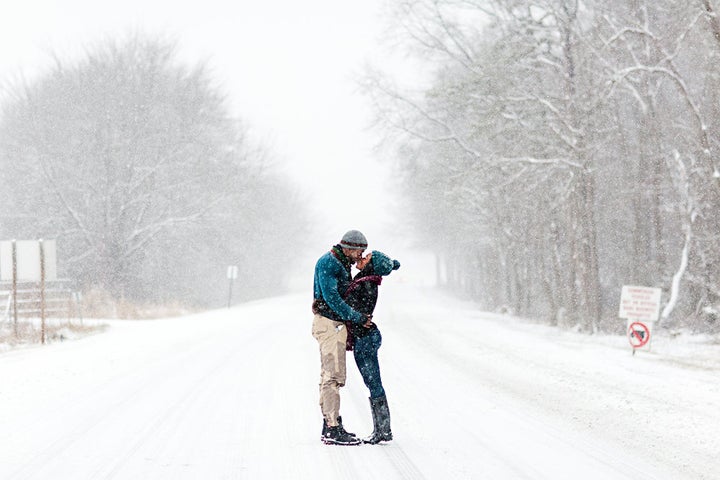 Felicia and David share a snowy smooch. 