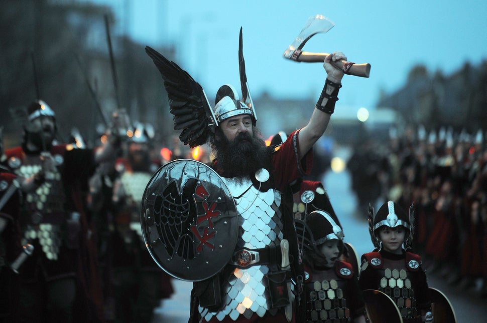 Participants dressed as Vikings fill the street for the annual Up Helly Aa festival in Lerwick, Shetland Islands, o