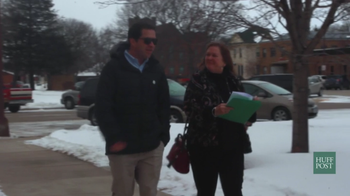 Jane Sanders and her son, Dave Driscoll, walk toward Esterville Public Library before a campaign event on January 19, 2016.