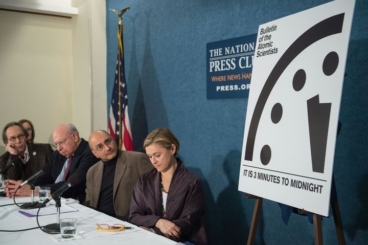 Lawrence Krauss, chair of the Bulletin of Atomic Scientists' Board of Sponsors; Thomas Pickering; Sivan Kartha, member of the Bulletin's Science and Security Board; and Sharon Squassoni, member of the Bulletin's Science and Security Board (from left to right). Next to the panel is the 'Doomsday Clock' in Washington, DC, on Jan. 26.