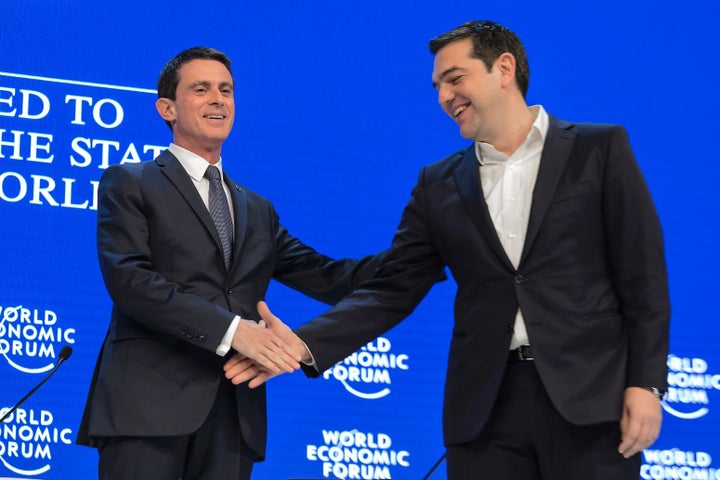 An ally against the IMF? French Prime Minister Manuel Valls, left, shakes hands with Greek Prime Minister Alexis Tsipras on Jan. 21, 2016, at the World Economic Forum in Davos, Switzerland.