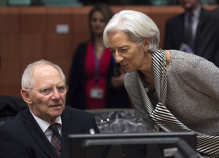 IMF Managing Director Christine Lagarde, right, speaks to German Finance Minister Wolfgang Schaüble. In the context of t