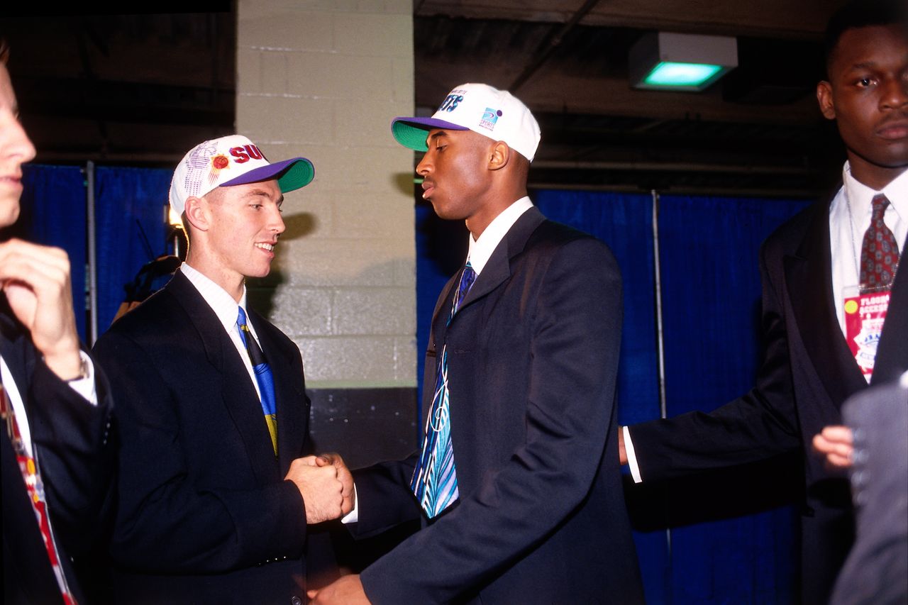 Steve Nash and Kobe Bryant greet each other after getting selected No. 15 and No. 13, respectively, in the 1996 NBA Draft.