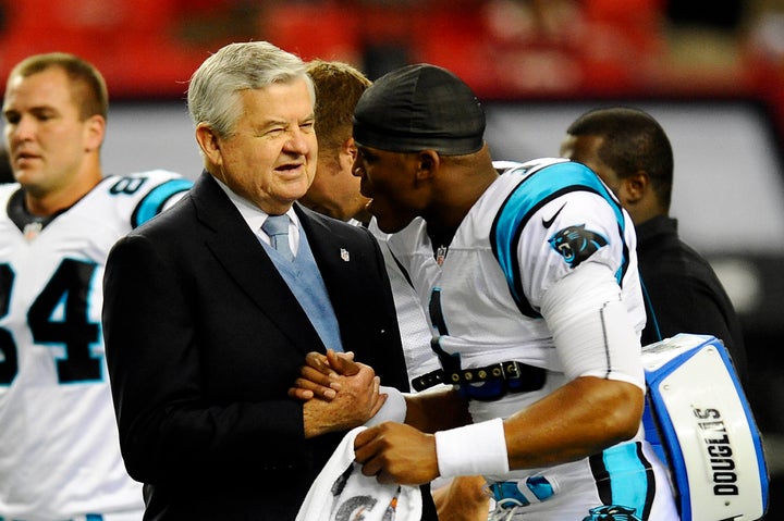 Carolina Panthers owner Jerry Richardson greets quarterback Cam Newton prior to Carolina's game against the Atlanta Falcons a