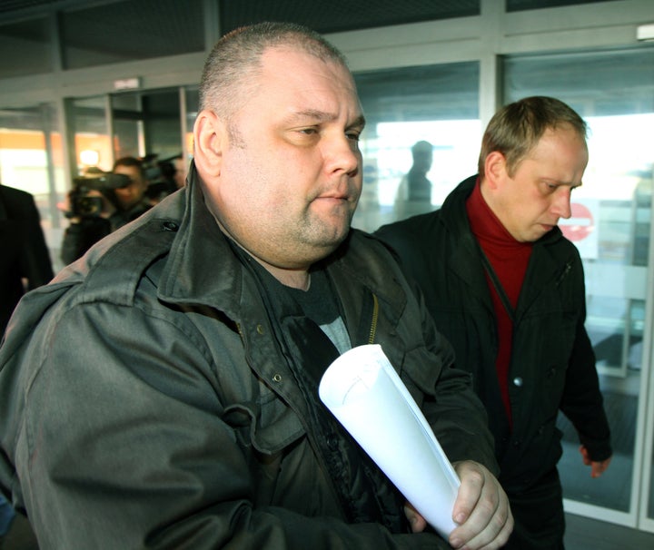 Lithuania has arrested former Soviet army officer Yuri Mel, above, suspected of committing war crimes during a bloody 1991 crackdown on the Baltic state's independence drive. Above, Mel is brought to the district court in Vilnius on March 14, 2014.