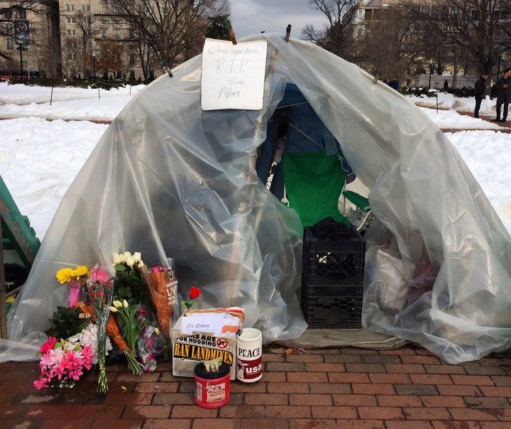 People left bouquets of flowers at the vigil on Wednesday in memory of Picciotto.