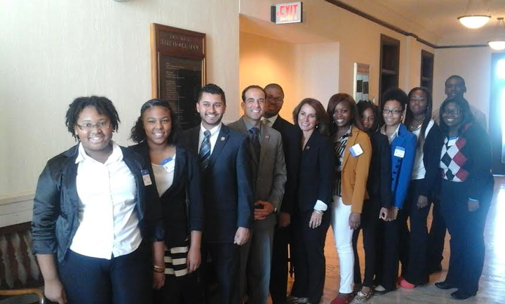 Members of the Boys & Girls Clubs of Hudson County are seen with state Assemblymen Raj Mukherji, third from left, and Carmelo Garcia, fourth from left, in an undated photo.