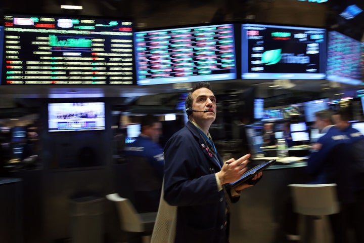 Traders work on the floor of the New York Stock Exchange (NYSE) on January 29, 2016 in New York City.