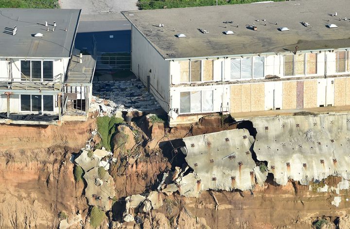 Three more months of wet weather likely won't be enough to undo the effects of the long drought in California, however. In this photo, apartments are seen at the edge of an eroding cliff in Pacifica, California, on Jan. 27. The erosion process of many coastal buffs have intensified by storms and waves due to El Nino.