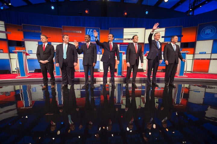 Republican Presidential candidates (L-R) Senator Rand Paul, New Jersey Gov. Chris Christie, retired neurosurgeon Ben Carson, Texas Senator Ted Cruz, Florida Senator Marco Rubio, former Florida Gov. Jeb Bush, and Ohio Gov. John Kasich arrive for the Republican Presidential debate sponsored by Fox News at the Iowa Events Center in Des Moines, Iowa on January 28, 2016.