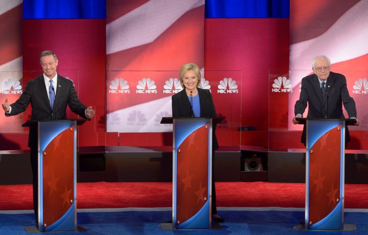Martin O'Malley, Hillary Clinton and Bernie Sanders appear during the NBC Democratic debate in South Carolina on Jan. 17. A new survey suggests single women find Clinton more likable than they find Sanders.