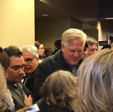 Glenn Beck is mobbed by Cruz supporters after an Iowa rally.