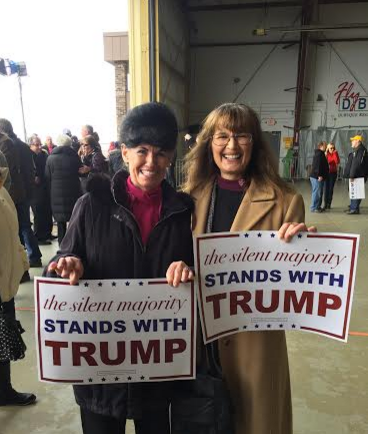 Rebecca Thoeni, right, at a rally for Donald Trump in Dubuque, Iowa