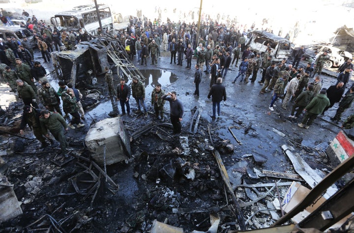 A car bomb and two suicide bombers killed dozens in the Sayeda Zeinab district of Damascus on Sunday.